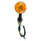 Amber motorcycle turn signal lamp with black mounting base and colored wire leads