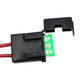 Plastic wiring adapter with green indicator window and red wire leads
