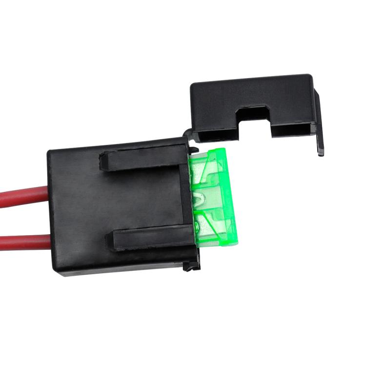 Plastic wiring adapter with green indicator window and red wire leads
