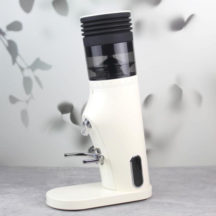Coffee grinder with fitted black ribbed blowing hopper and clear outlet