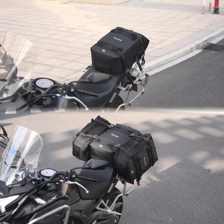 Black motorcycle rear seat bag mounted on a motorcycle with side compartments attached.