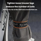 Reflective pant band around gray trouser leg, black band with orange reflective strip