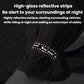Reflective cycling pant band on dark pants, black band with high-gloss orange trim