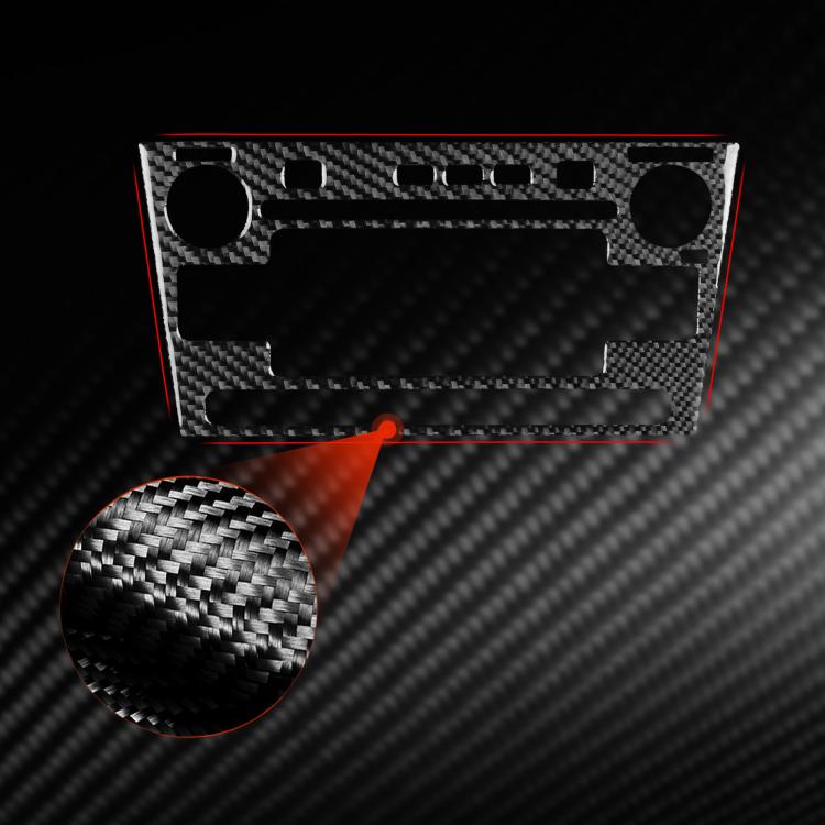 Red carbon-fiber car radio panel sticker with round texture detail