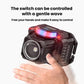 Black motion-sensing headlamp with glowing red switch indicator and front lens