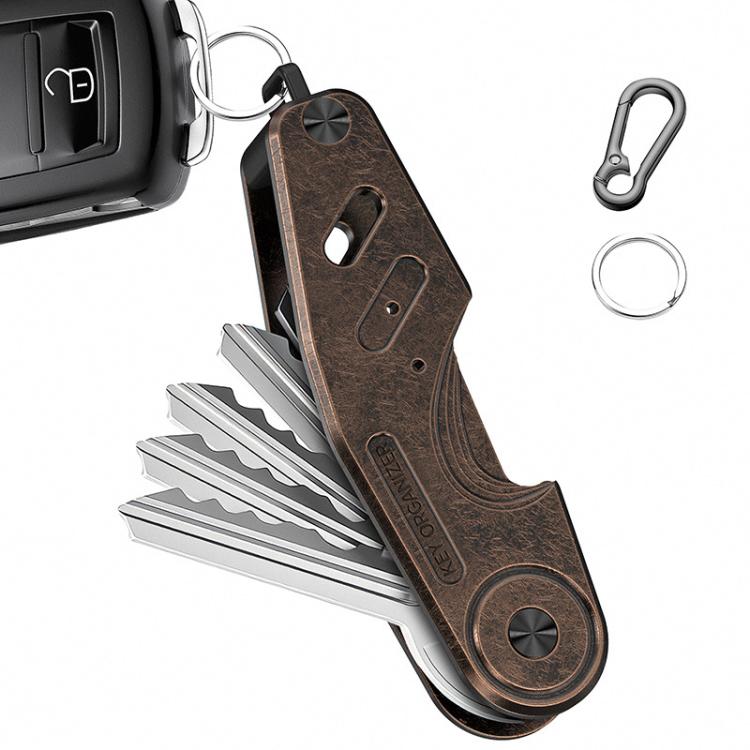 Copper/brown aluminum key holder clip with key fob attachment and folded key tool