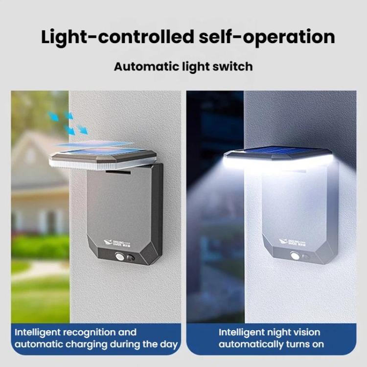 Solar motion sensor garden wall light with bright white LED illumination on panel