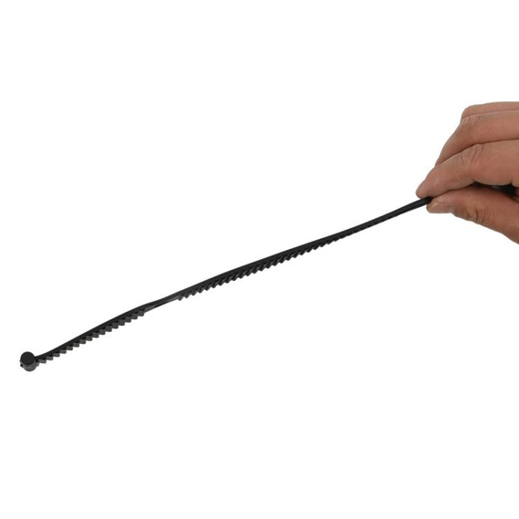 Bike rack frame fixing strap band with textured edge, held taut by hand