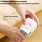 Rechargeable electric foot file with LED display held against a foot for grinding