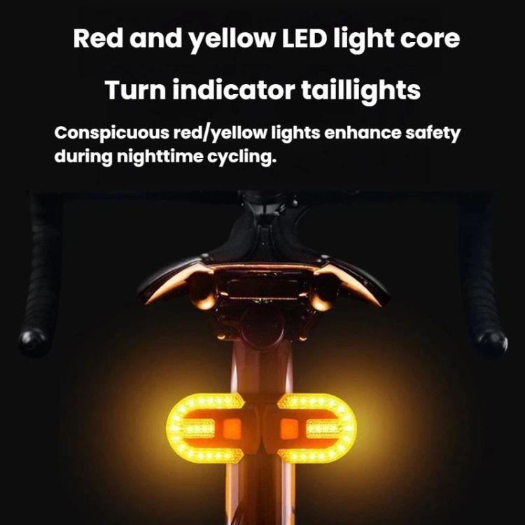 Red and yellow bike turn indicator taillights glowing with arrow-style LEDs