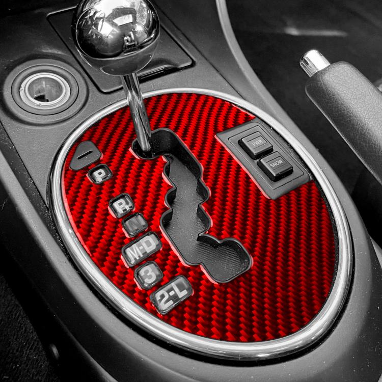 Installed gear shift panel sticker on console, red carbon fiber with gear cutouts