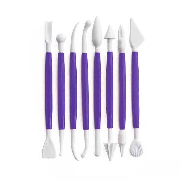 Pottery clay sculpting tools set with purple handles: carving blades, picks, and spatulas