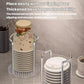 Silver acrylic cup holder holding two stacks of paper cups on a clear ridged base