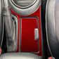 Red carbon-fiber cupholder sticker insert with side slot, installed in vehicle