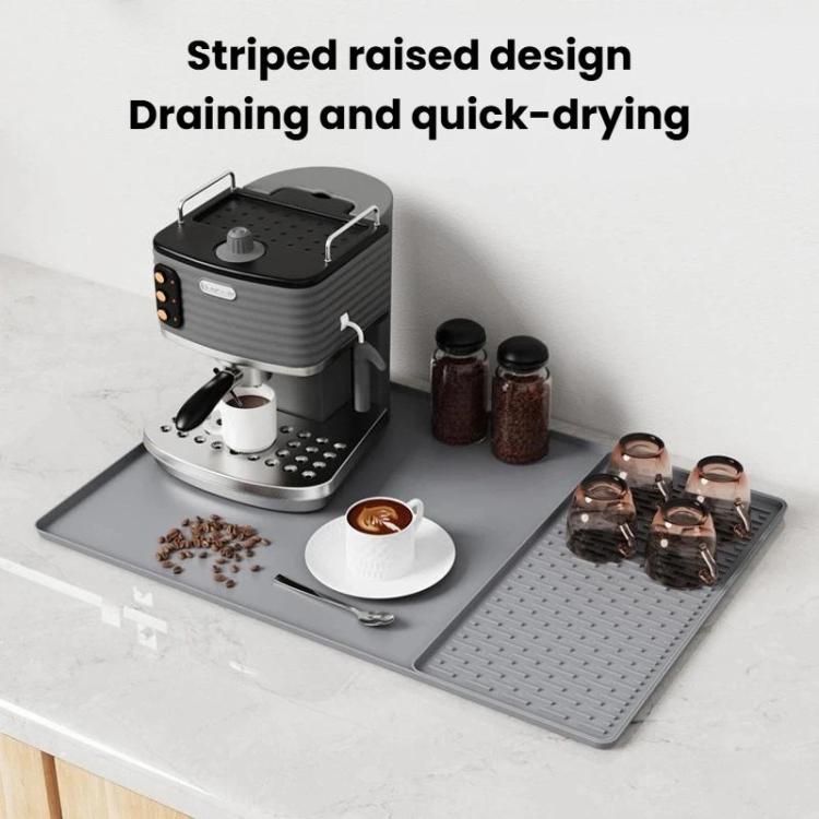 Gray silicone draining tray mat with raised striped texture for quick drying