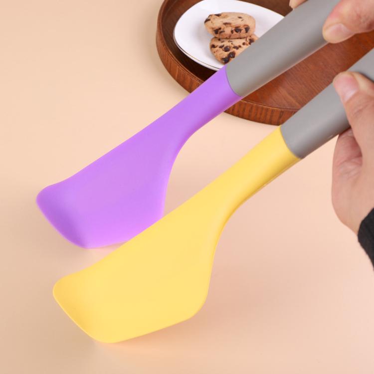 Silicone baking spatulas with purple and yellow heads, grey handles