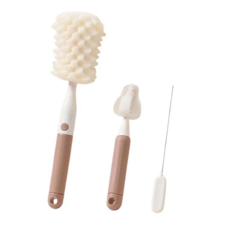 Cleaning brush set with straight handle and sponge bottle brush heads, pink and white.