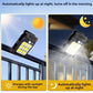 Two black solar clip-on garden lights on railing, bright LED illumination