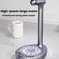 Grey electric water dispenser pump with display window and white mug