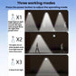 Black solar clip-on pathway light with three operating modes on a walkway