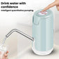 Automatic water dispenser pump with stainless spout pouring water into a cup