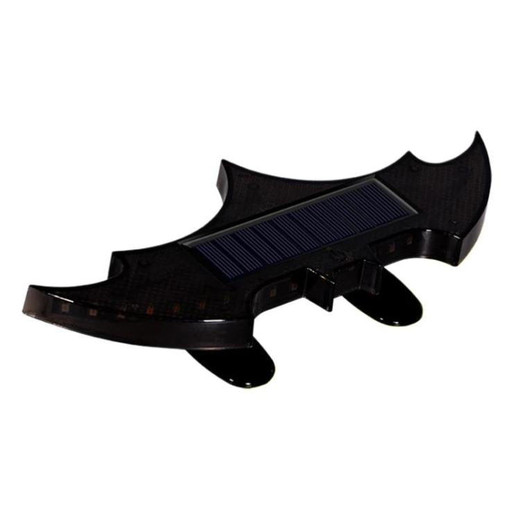 Solar-powered rear wing light, bat-shaped black housing with solar panel and LED strips