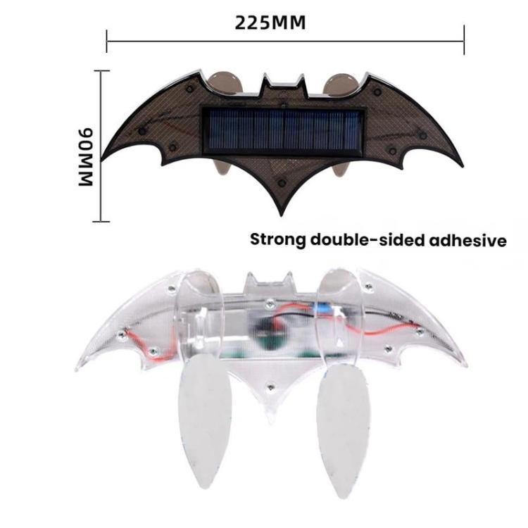 Solar-powered rear wing light with solar panel and adhesive tabs; bat-shaped design