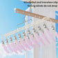 White drying clip hanger with pink and pastel padded clamps for socks and underwear