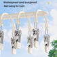 White drying clip hanger with multiple stainless steel clips and white padded grips