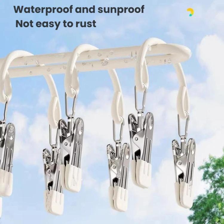 White drying clip hanger with multiple stainless steel clips and white padded grips