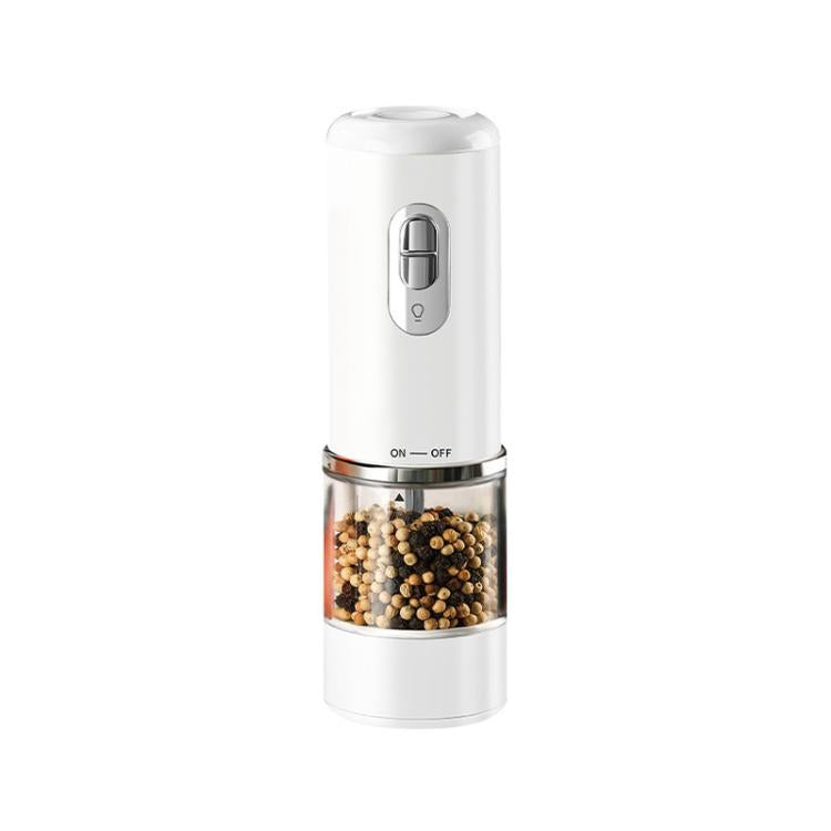 White electric grinder with clear chamber filled with mixed peppercorns and control switch
