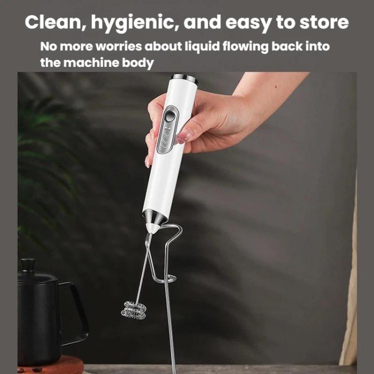 White wireless frother with whisk beater and wire stand