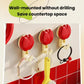 Multiple red flower suction cup towel racks mounted on a wall with leaf hooks