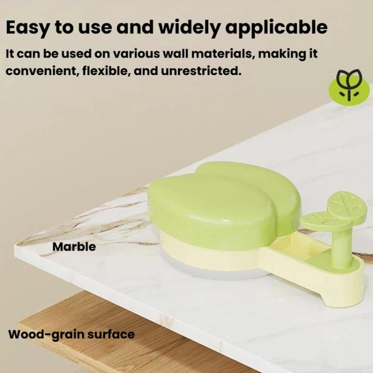 Green suction cup towel rack with leaf hook and base for easy countertop mounting
