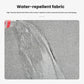 Close-up of water-repellent textured fabric surface on a gray insulated bag