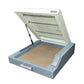 Mini heat drying oven with open lid and beige transfer film on the baking tray