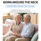 Neck-worn hearing aid headphones in use, with black earbuds in ears and neckband visible