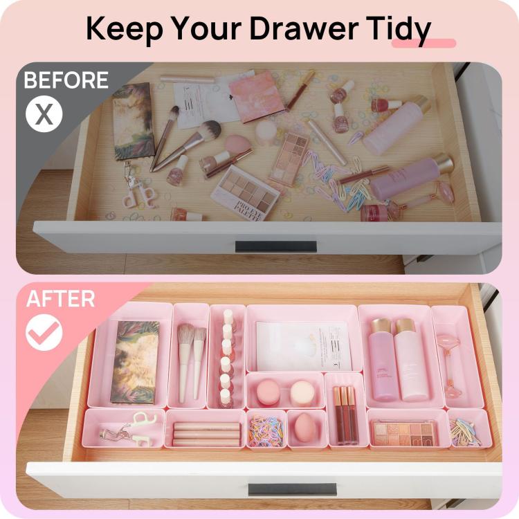 Pink drawer organizer trays neatly arranging cosmetics and small accessories