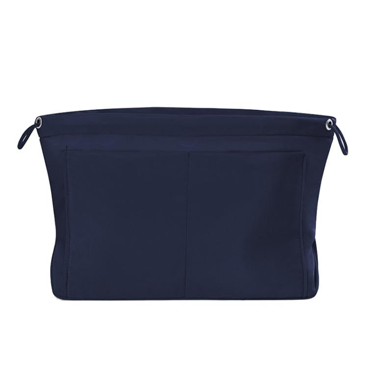 Navy blue fabric mini organizer pouch insert with top drawstring and interior divider seams