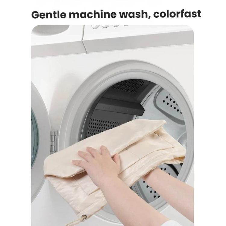 Apricot-beige mini bag organizer insert pouch being washed in a washing machine