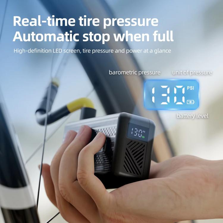 Compact electric air pump with illuminated LED display showing tire pressure and PSI