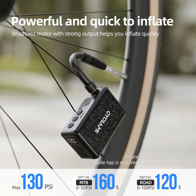 Portable electric air pump connected to a bicycle tire, black body with nozzle and hose