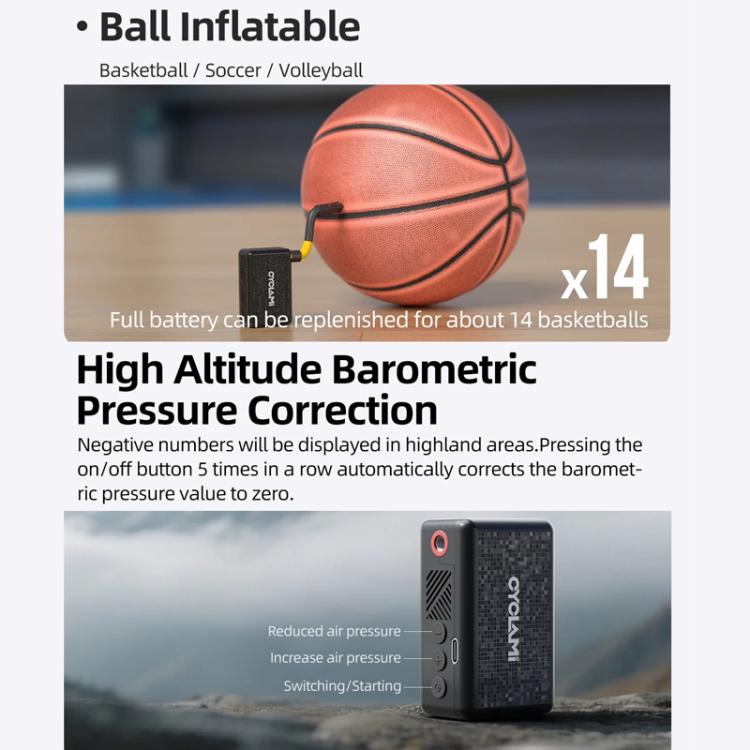 Portable electric air pump standing upright on a surface, black body with red power button