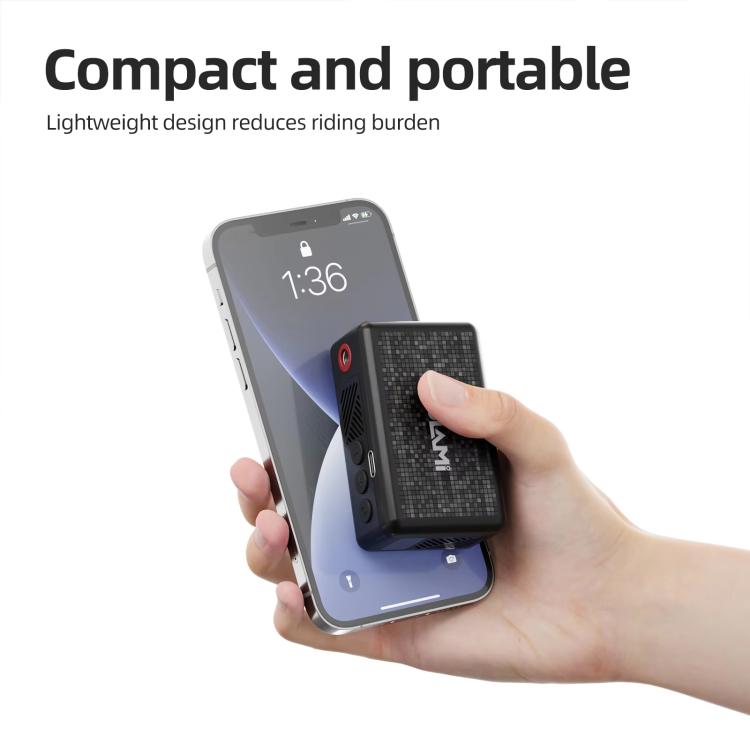 Electric air pump controlled with a smartphone app, compact black pump in hand