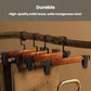Brown wooden pants hanger set with black clamps and curved hanging hooks on rod
