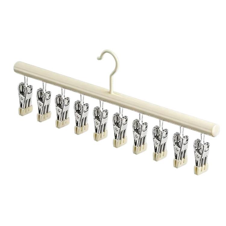 White sock drying rack with multiple stainless clips and hanging hook