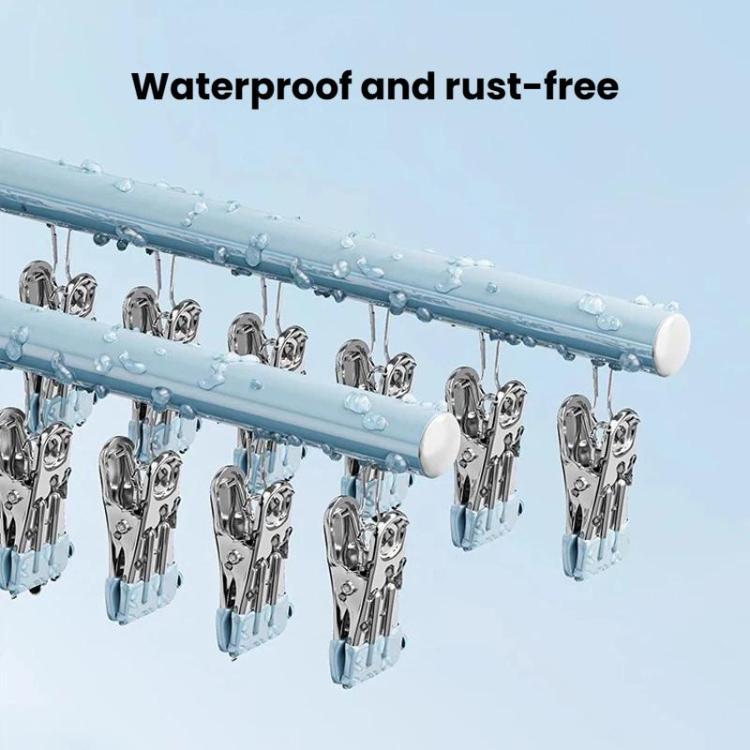 Blue sock drying rack with stainless clips and water droplets on bar