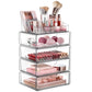 Clear acrylic desktop makeup organizer with top brush rack and three stacked drawers
