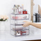 Clear acrylic makeup organizer with multiple pull-out drawers and top brush holder rack