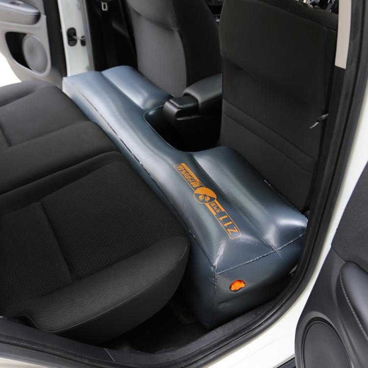 Inflatable rear seat gap filler air mat installed in car, dark blue cushion